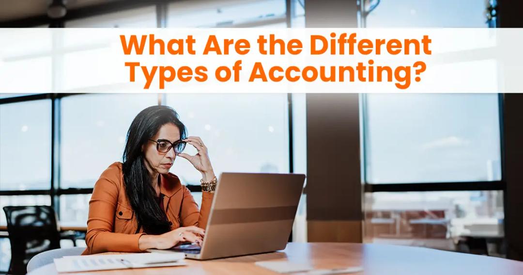 A woman in glasses sits at a table in a bright office, looking at her laptop with a focused expression, with text overhead reading "what are the different types of accounting?.