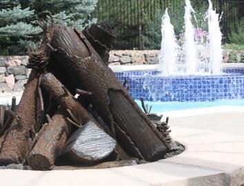 Fountain and a pile of wood