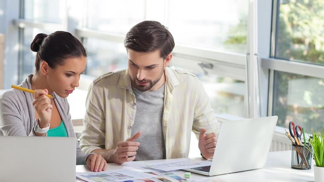 Two people working on something